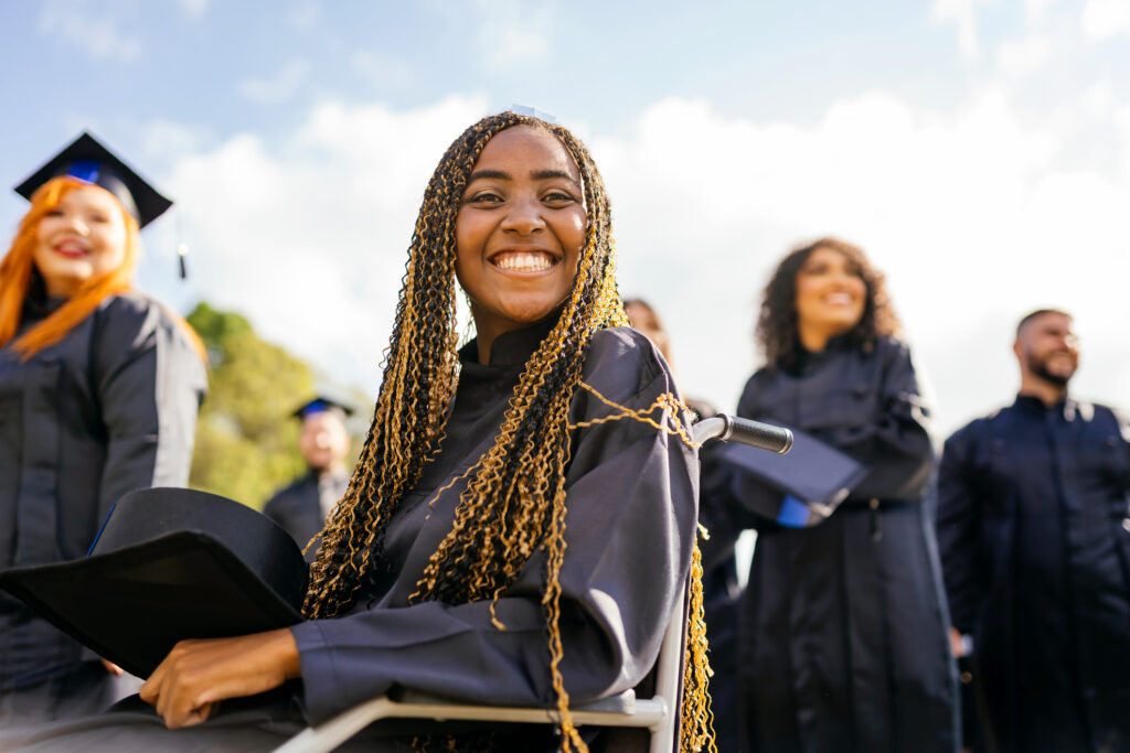 Graduation party celebration with students wearing caps and gowns, cheering, taking selfies, and celebrating success at a festive night event with confetti, lights, and friends capturing Instagram photos.A